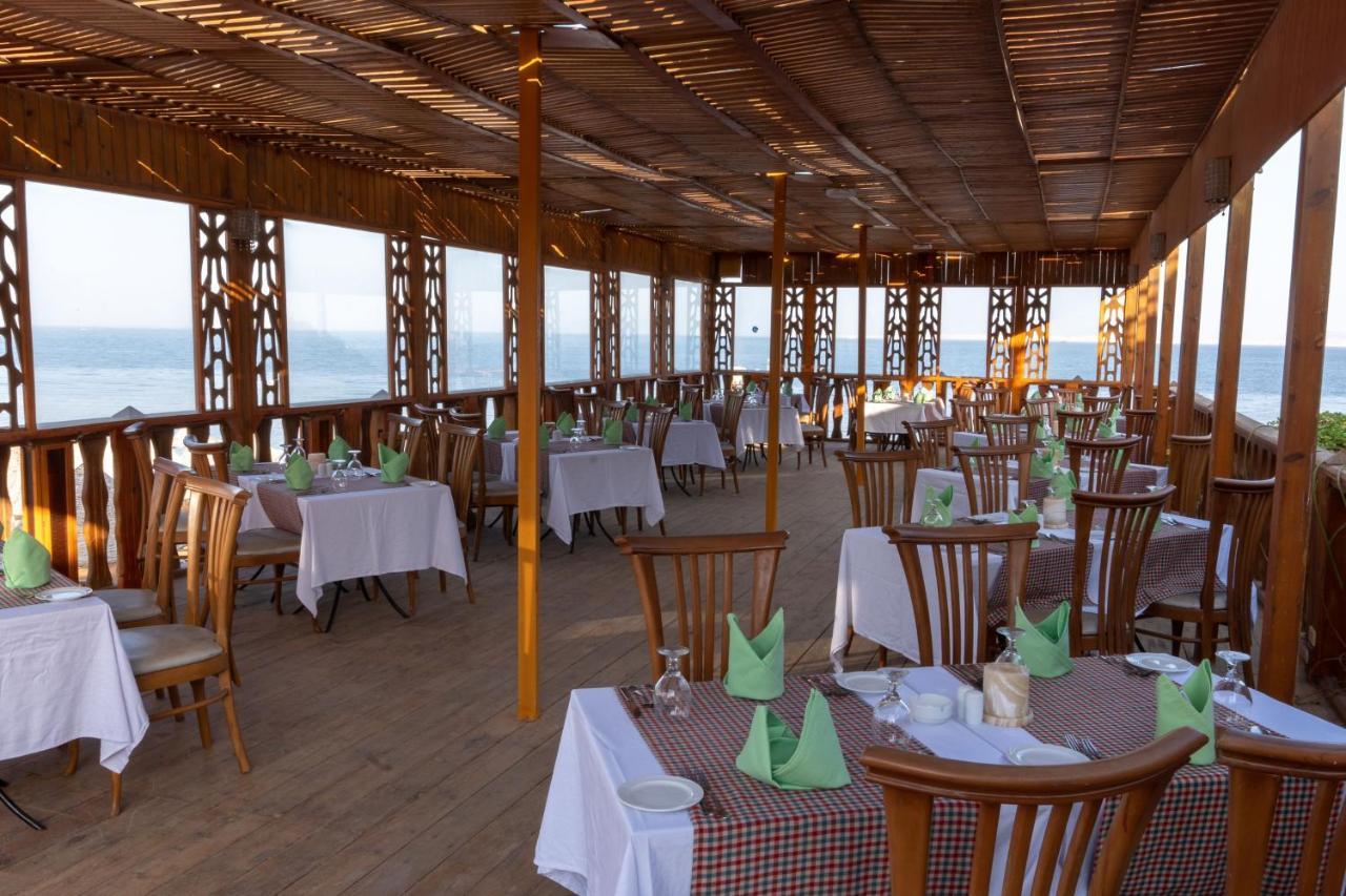 Parrotel Beach Resort Sharm el-Sheikh Exterior photo Restaurant
