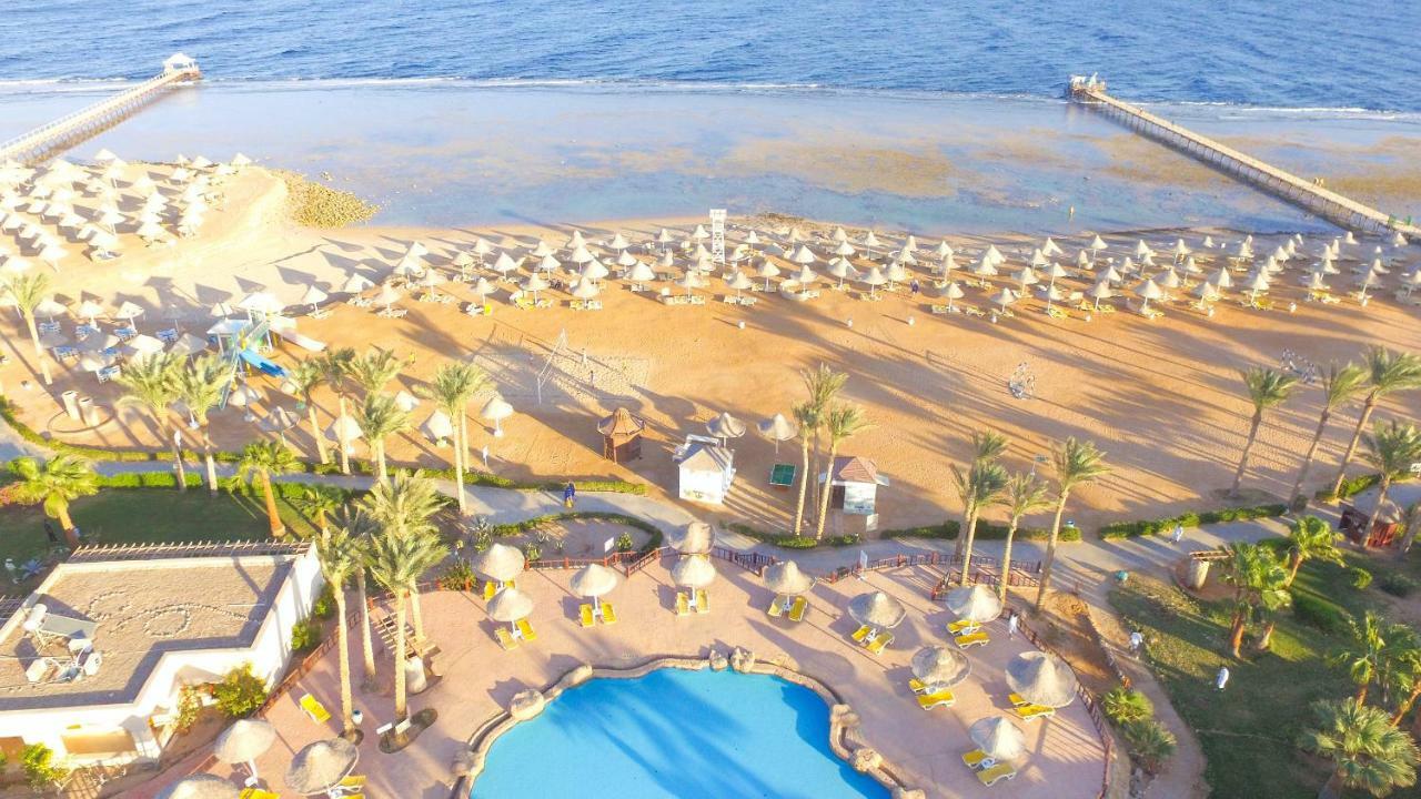 Parrotel Beach Resort Sharm el-Sheikh Exterior photo Aerial view of the beach at the Hilton Sharm El Sheikh